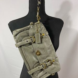 Authentic leather Coach oversized clutch with wrist strap and dust bag
